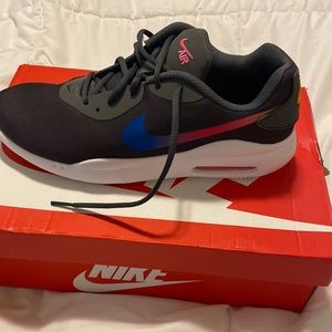 Brand new Nike Air Oketo sneakers woman’s size 11. Gray with blue and pink.